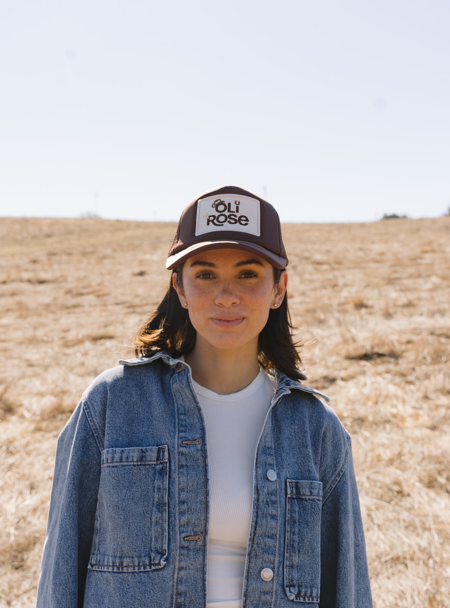 OLI ROSE PATCH TRUCKER HAT