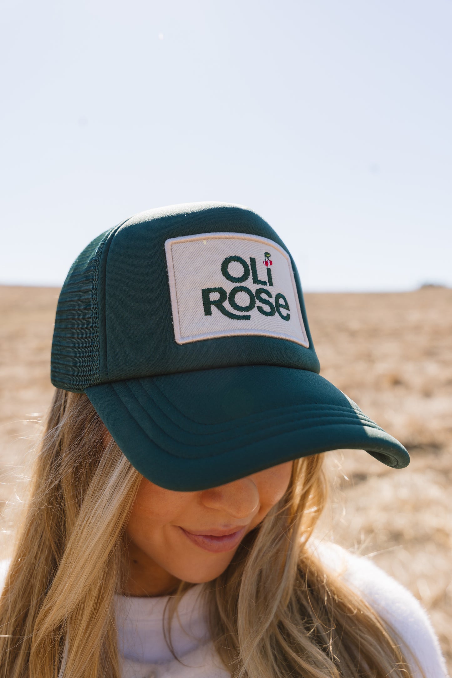 OLI ROSE PATCH TRUCKER HAT