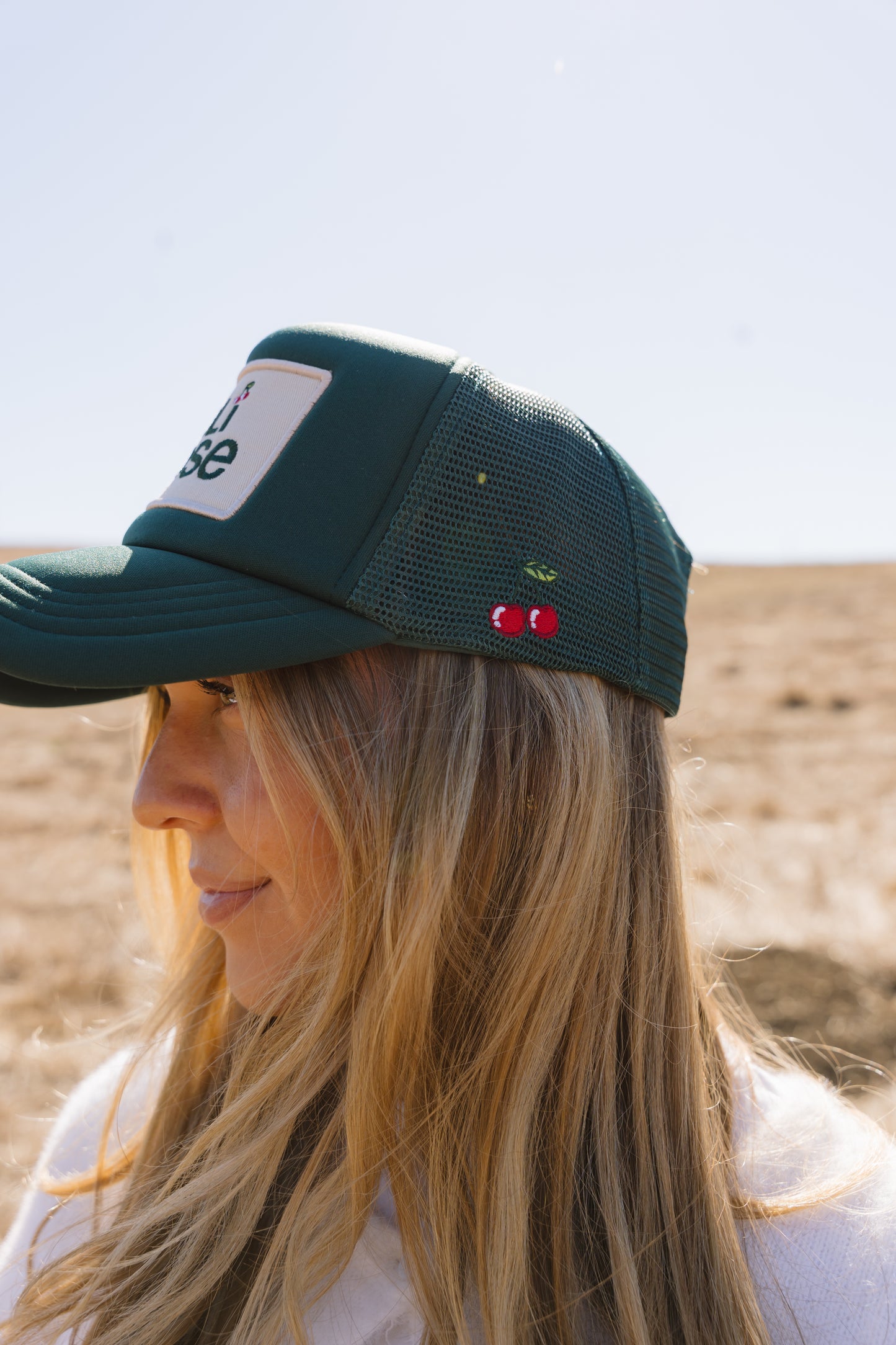 OLI ROSE PATCH TRUCKER HAT